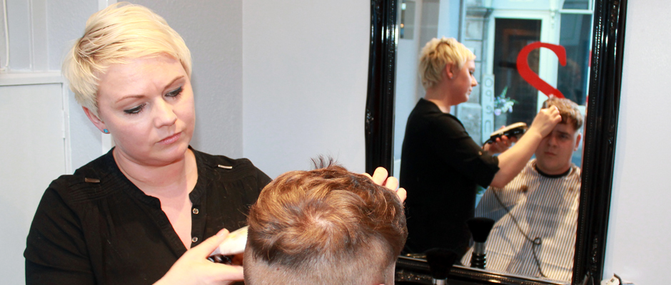 Sandra cutting hair at S Barbers